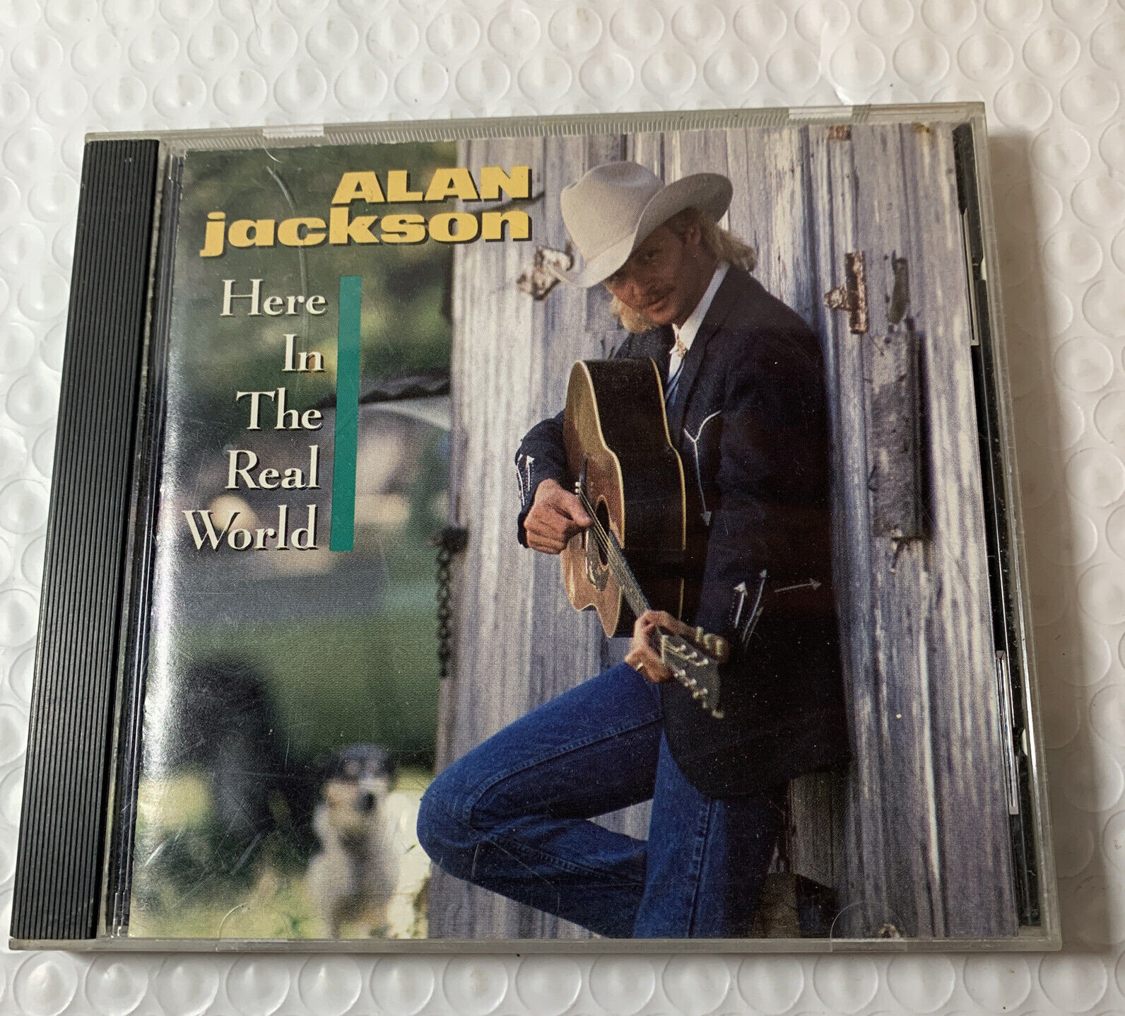 alan jackson here in the real world CD